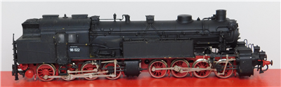 56129b