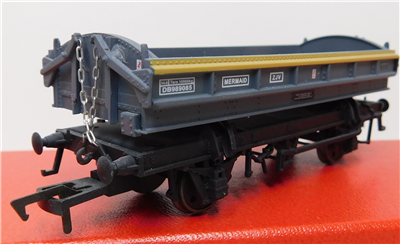 56577b